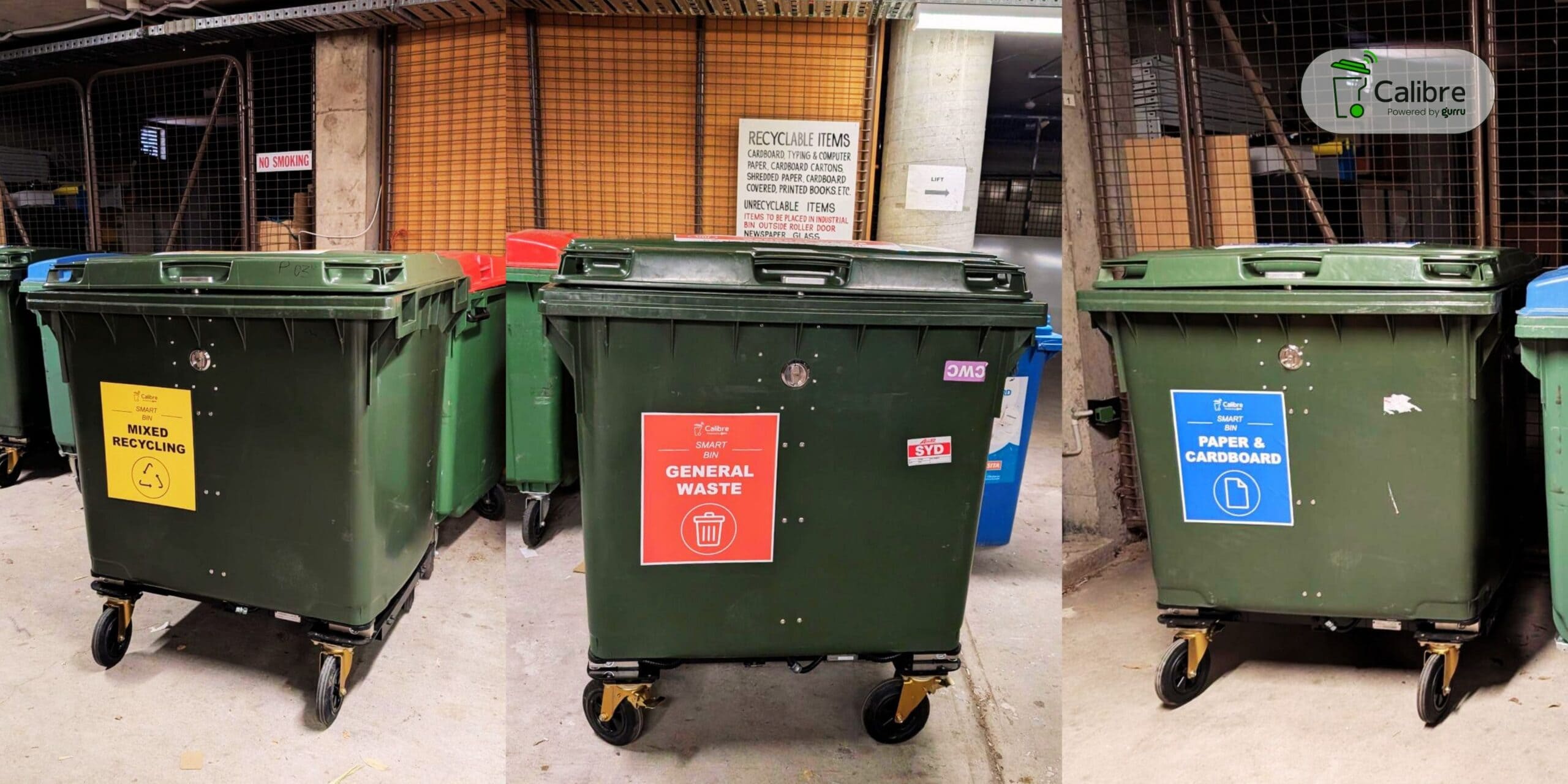 Three Calibre smart bins labelled Mixed Recycling, General Waste, and Paper & Cardboard in a bin room